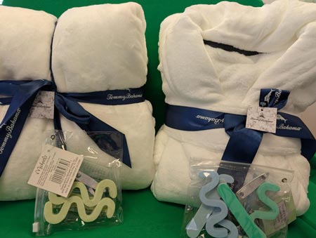 Tommy Bahama spa set with a robe, blanket and manicure/pedicure tools from Teresa Espy